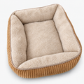 Hundebett Cord in Camel mit cremefarbenem Teddy-Plüsch und Rand rundum